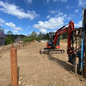 Excavator using Fence Post Rammer Tool